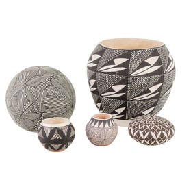 A group of Acoma Pueblo black and white pottery