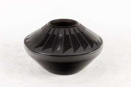 A Martha Appleaf (b.1950) Ildefonso Pueblo blackware feather decorated vessel