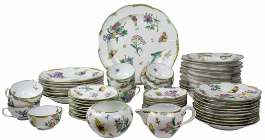 A Herend porcelain partial dinner service in the 'Queen Victoria' pattern