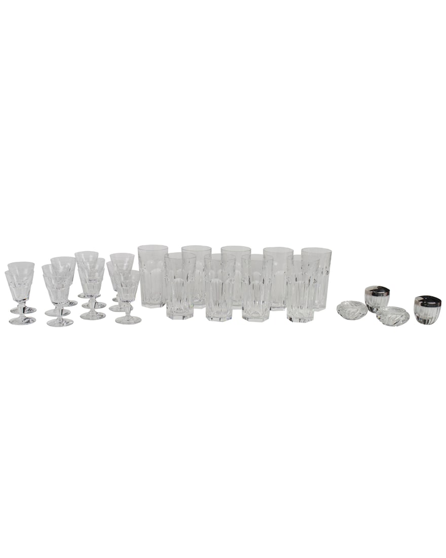 A group of Baccarat glass in the 'Harcourt' pattern: A group of Baccarat glass in the 'Harcourt' pattern, each with acid etched factory mark, comprising (9) tumbers, 5.5"h and (11) cordials, together with a pair of Baccarat open salts and a pair of Bacc