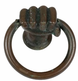 An Italian Renaissance bronze hand form door knocker