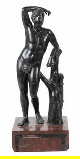 An Italian Neoclassical patinated bronze figure of the Apollini or Medici Apollo: An Italian Neoclassical patinated bronze figure of the Apollini or Medici Apollo, 18th century, after the antique, raised on rouge griotte base, 14.5"h. Provenance: Property of a San Francisco Private