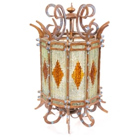A Spanish Revival paneled glass and wrought iron light fixture circa 1920