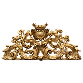 A large Continental Baroque giltwood architectural crest