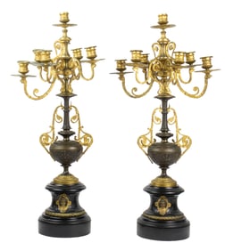 A pair of French Aesthetic gilt and patinated bronze candleabra
