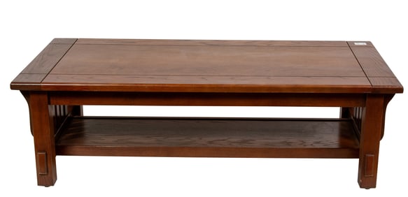 An Arts and Crafts style oak low table