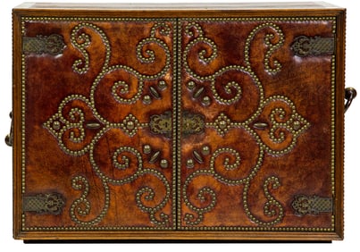 A Mid-Century studded faux leather covered bar cabinet in the Spanish Revival taste