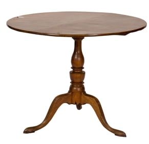 A Georgian tilt top round table