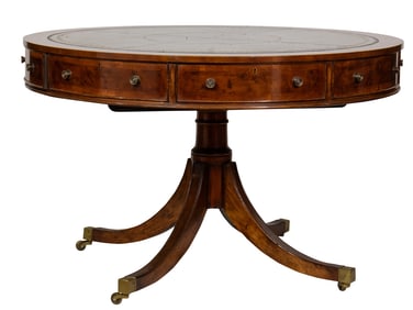 A Regency mahogany and satinwood drum center table circa 1810 in two parts