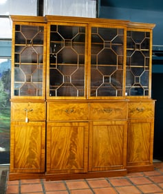 An English Regency breakfront mahogany secretary circa 1800