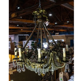 A Belle Epoque gilt bronze and cut glass eight light chandelier