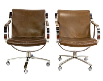 A pair of Gardner Leaver for Steelcase chromed steel and leather office chairs