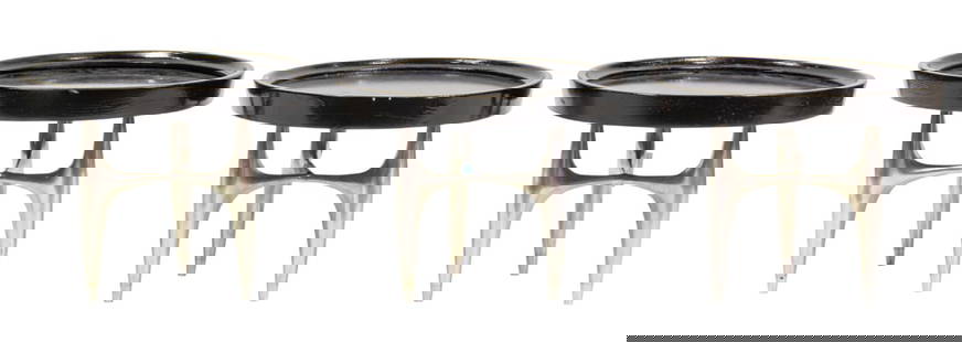 A suite of three Modernist Donald Deskey for Charak Modern low tables: A suite of three Modernist Donald Deskey for Charak Modern low tables, each with circular top above aluminum legs, 11"h x 13.5"w