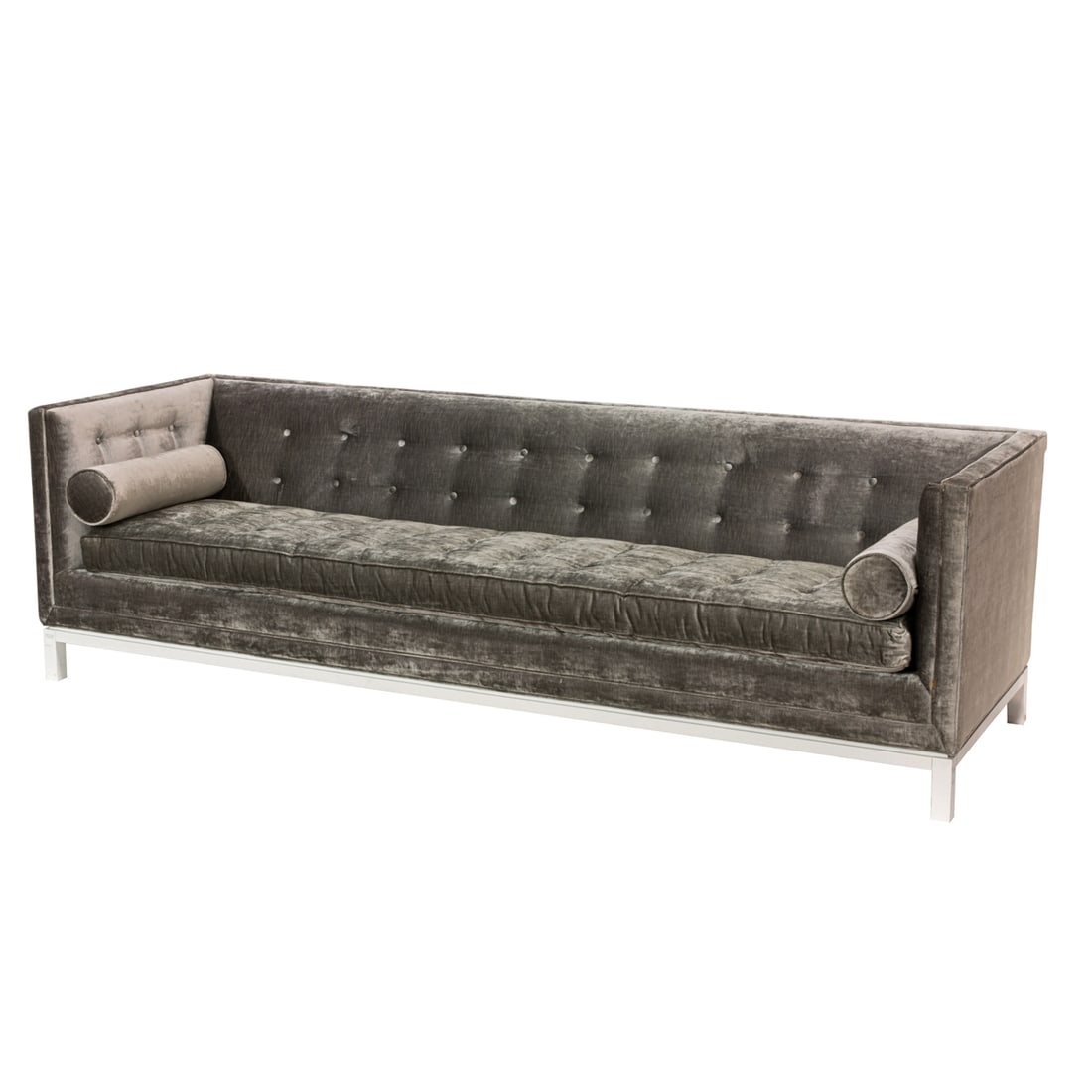 A contemporary Jonathan Adler tufted sofa: A contemporary Jonathan Adler tufted sofa, with velvet upholstery, two bolsters, and rising on square legs, 31"h x 105"w x 36"d