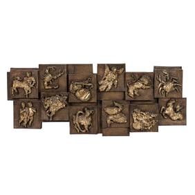 A Brutalist faux bois and metal panel with Zodiac figures