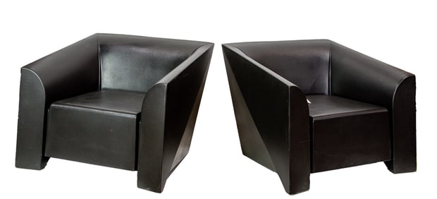 A pair of Mario Bellini for Heller plastic armchairs