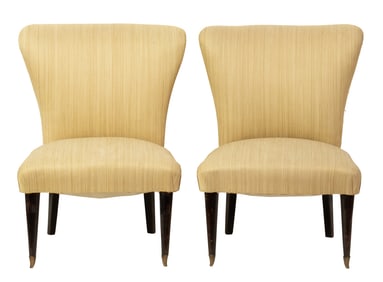 A pair of Italian Mid-Century Modern upholstered low chairs circa 1950