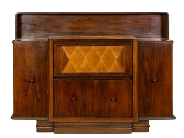 An Italian Mid-Century Modern rosewood bar cabinet designed by Osvaldo Borsani