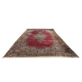 A Persian Kerman carpet