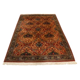 A William Morris style hand made carpet in the Arts and Crafts taste