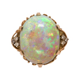 An opal, diamond and 10k gold ring
