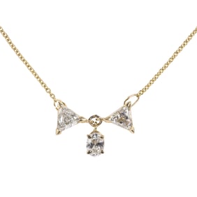 A diamond and 14k gold necklace
