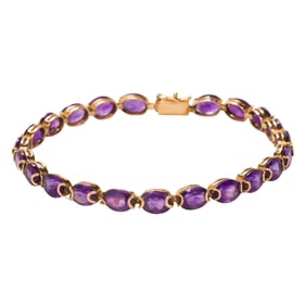 An amethyst and 14k gold bracelet