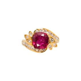 A ruby, diamond, and 14k gold ring