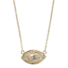 A diamond and 14k gold necklace