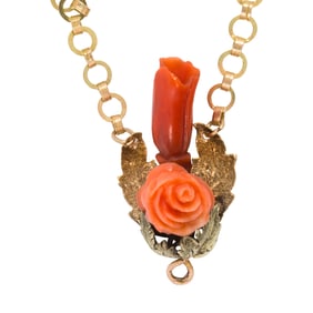 A coral and 14k gold necklace