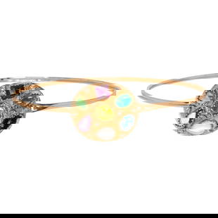 A gemstone, diamond and 14k gold bangle bracelet: A gemstone, diamond and 14k gold bangle braceletFeaturing 16 bezel-set gemstones of varying shapes and sizes, including moonstone, tourmaline and emerald, accented by round brilliant-cut diamonds; 8.0