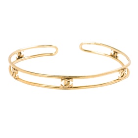 An 18k gold cuff bangle