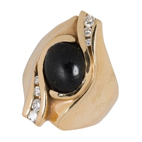 An onyx, diamond, and 14k gold ring