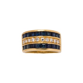 A diamond, sapphire and 18k gold ring