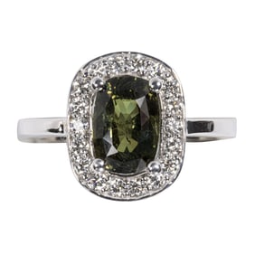 A natural alexandrite, diamond, and 18k white gold ring