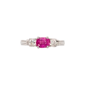 A ruby, diamond, and 14k white gold ring