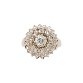 A diamond and 14k white gold ring