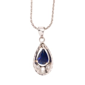 A diamond, sapphire, and platinum necklace