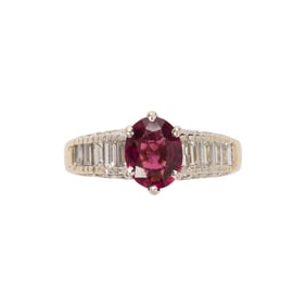 A rhodolite garnet, diamond, and 14k gold ring
