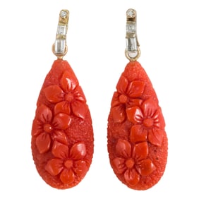 A pair of coral, diamond, and 14k gold earrings