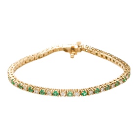 A diamond, emerald, and 14k gold bracelet