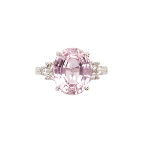 A kunzite, diamond, and 18k white gold ring