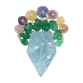A sapphire, aquamarine, emerald, diamond, and silver brooch