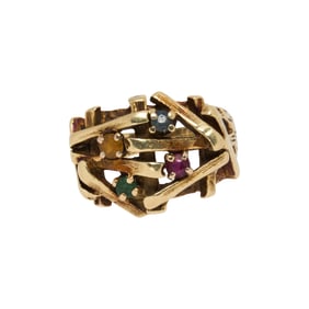A gemstone and 14k gold ring