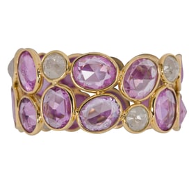 A pink sapphire, diamond and 18k gold ring