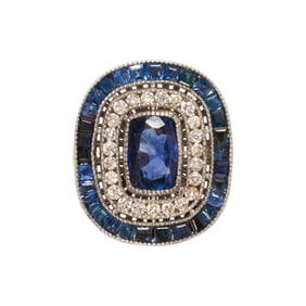 A sapphire, diamond and platinum ring