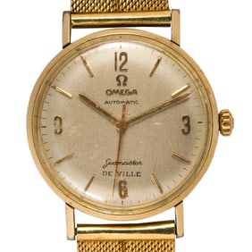 An Omega 18k gold seamaster wristwatch