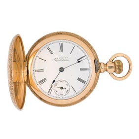 A Waltham 14k gold pocket watch