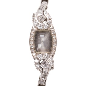 A diamond, platinum, and14k white gold watch case