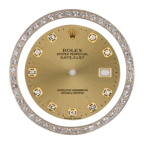 A Rolex face and diamond bezel